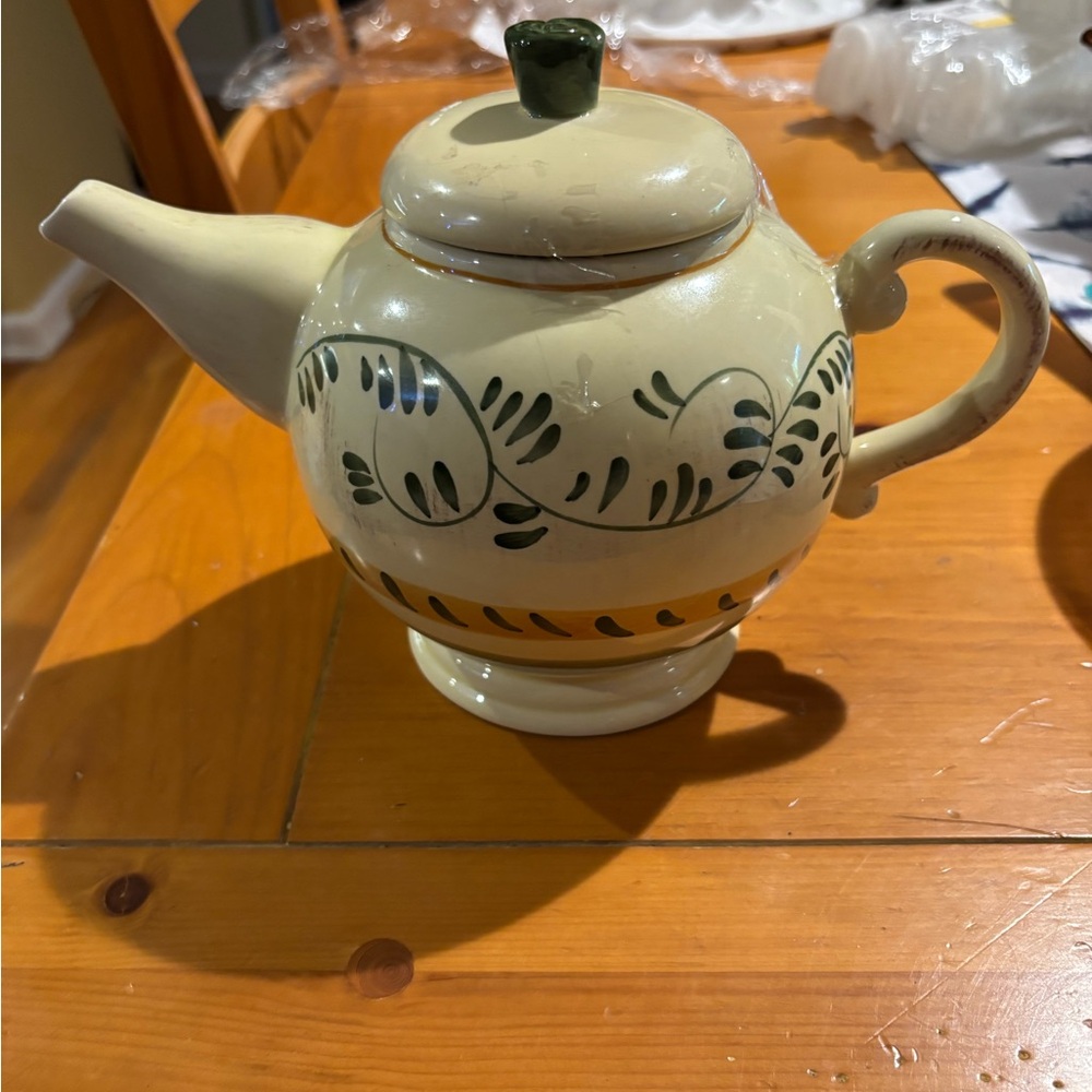Elegant Ceramic Teapot with Green Accents